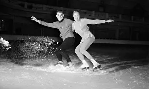 Winter Sports Prints: 18 year old Barbel Martin German figure skating champion with 26 year old Charles