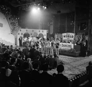 18-year-old Marita Lindahl of Finland is awarded the title of MIss World 1957