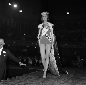 18-year-old Marita Lindahl of Finland is awarded the title of MIss World 1957