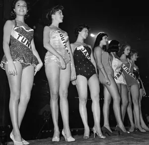 18-year-old Marita Lindahl of Finland is awarded the title of MIss World 1957