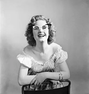 18 Yrs old actress Shirley Lorimer displaying the spectacles. May 1953 D2541-001