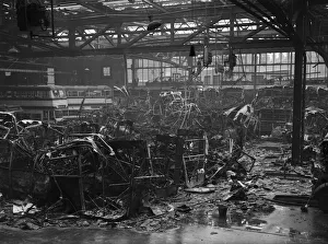 Garage Prints: 19 burnt out and four partly burnt out buses sit in the remains of Hockley bus depot