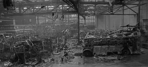 19 burnt out and four partly burnt out buses sit in the remains of Hockley bus depot