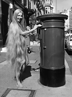 Letter Prints: 19 Year Old Holly O Neill from Chelsea is seen here wearing a wig thats just