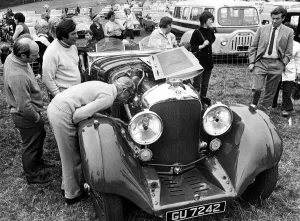 This 1929 Bentley 4 1 / 2 litre in Britiish racing green is one of the vintage vehicles up