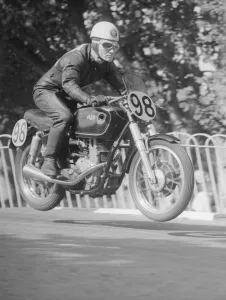 Mid Air Prints: 1952 Isle of Man Grand Prix 10th September 1952 R McIntyre takes a jump