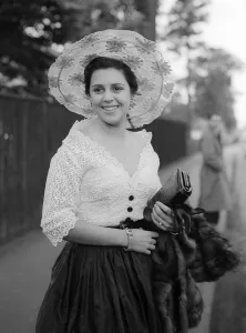 00196 Prints: 1953 Clothing Ascot Fashion Hazel Wood-Smith wearing a wide brimmed bonnet style hat