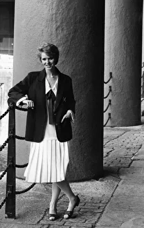 00544 Prints: 1980s Womens Fashion: Our model seen here at the Albert Dock wears a navy blazer