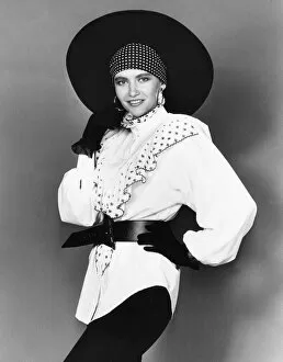 Images Dated 7th August 1989: 1980s Womens Fashion: Our model wears. White frill belted blouse black leggings