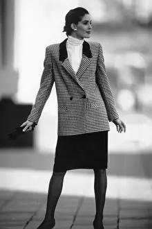 One Young Woman Only Prints: 1980s Women,s Fashion: Our model wears Check double breasted jacket with black skirt