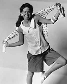 One Young Woman Only Prints: 1980s Women,s Fashion: Our model wears shorts sleeveless blouses