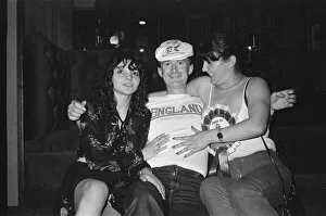 1982 World Cup Finals in Spain. An English fan poses with two women in Spain