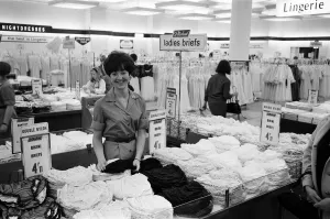 21-year-old Lesley Chapman from Penge seen working behind the counter of the Oxford