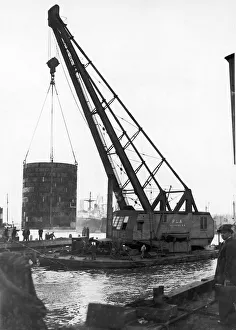 00094 Prints: 250 ton crane lifting a new turbine for Deptford Power Station. 29th April 1949
