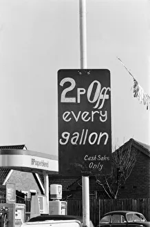 Prices Prints: 2p off every gallon, cash sales only'offer at a petrol station in West