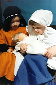 00519 Prints: 3-Year-Olds James Newman and and Anna Davies with baby Jesus at St George