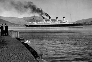 The 45, 000 ton liner Aquitania arrives at Gourock Pier on the The Clyde
