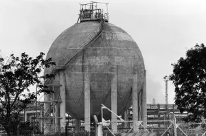 Industrial Prints: A 5000 ton chemical storage sphere is symbolic of the millions spent by the firm each