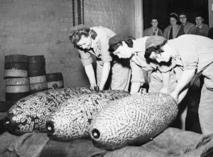 Three 500lb bombs covered in savings stamps purchased during Londons
