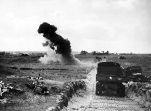 Artillery Prints: 531st Engineer Shore Regiment detonate German land mines to clear way for Allied advance
