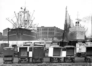 Cranes Prints: About 63 ships remain idle on London docks because the dockers are out in an unofficial