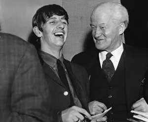 69 year old Ted Turner shares a joke with Rngo Starr during a rehearsal break