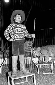7 years old Paul Colins, seen here in the circus ring lion taming