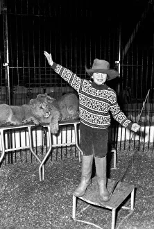 00044 Prints: 7 years old Paul Colins, seen here in the circus ring lion taming