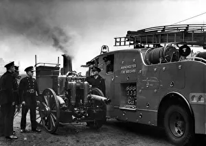 Firefighter Prints: A 79 year old Shand-Mason steamer fire engine bellows steam