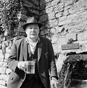 Pensioner Prints: 80-year-old Bob Smart drinking at the Batheaston horse trough. 26th March 1971