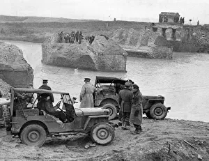 Bridges Prints: 8th Army engineers begin the construction of a new bridge over the river Uniti outside
