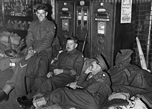 01467 Prints: 8th Army returning on leave from the Middle East. (left) Corpl. A