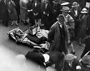 01215 Prints: 900 pilgrims to Lourdes. A woman pilgrim on a stretcher waiting to be entranced