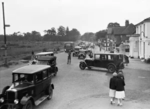 A a patrolman directs August Bank Holiday traffic outside The Orleans Arms situated