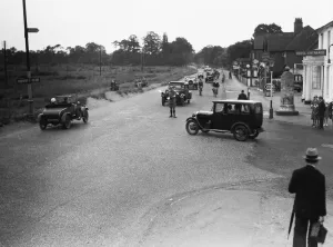 A a patrolman directs August Bank Holiday traffic outside The Orleans Arms situated