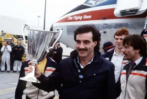 Landing Prints: Aberdeen team captain Willie Miller with the European Cup Winners Cup trophy after their