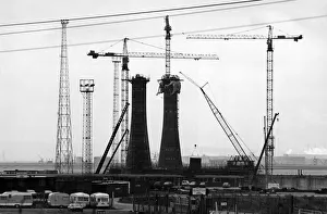 Companies Prints: ABLE UK. Twin concrete legs rise out of the ground near Hartlepool nuclear power station