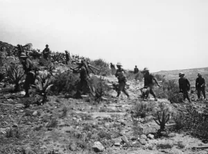 Italian Prints: Abyssinian War October 1935 Italian infantry with machine guns follow in the wake