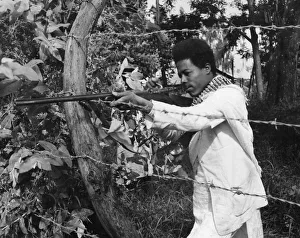 Aiming Prints: Abyssinian War September 1935 Abyssinian sniper seen here on the Ogadan Front