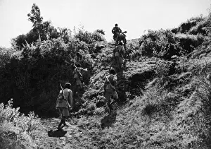 01023 Prints: Abyssinian War September 1935 Abyssinian troops advancing under cover on the Ogadan