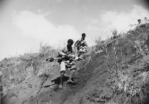 01023 Prints: Abyssinian War September 1935 Abyssinian troops advancing making for a new position