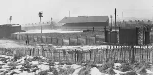 Winter Prints: Accrington Stanley Football Ground in the snow deserted following the collapse of