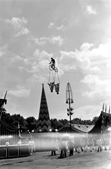00014 Prints: Acrobats and man riding a highrope on a bicycle at Battesea Pleasure Gardens