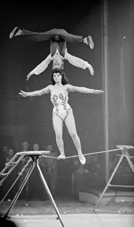 Tightrope Prints: Acrobats performing on the low wire at the Bertrams Circus Circa 1959