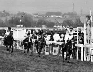 Action from the Grand National. Bob Champion celebrates as he crosses the line