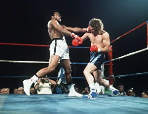 Action during the heavyweight fight between American Muhammad Ali and Britain