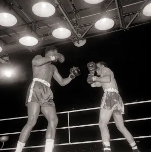 Action during the non-title heavyweight fight between American Cassius Clay