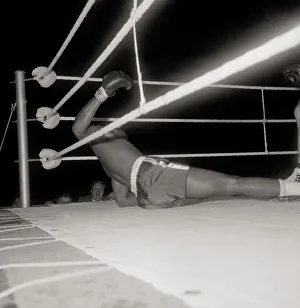 Action during the non-title heavyweight fight between American Cassius Clay