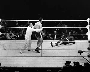 Action during the non-title heavyweight fight between American Cassius Clay