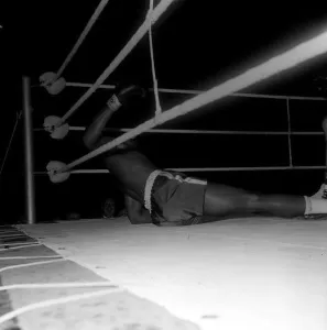 Action during the non-title heavyweight fight between American Cassius Clay